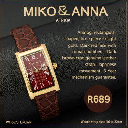 WT-0673 brown Watch Analog, rectangular shaped, time piece in light gold.  Dark red face with roman numbers.  Dark brown croc genuine leather strap.  Japanese movement.