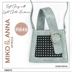 HB0073 Small, belt handle bag in Soft Grey with wicker detail on front. Light gold hardware and zip closure